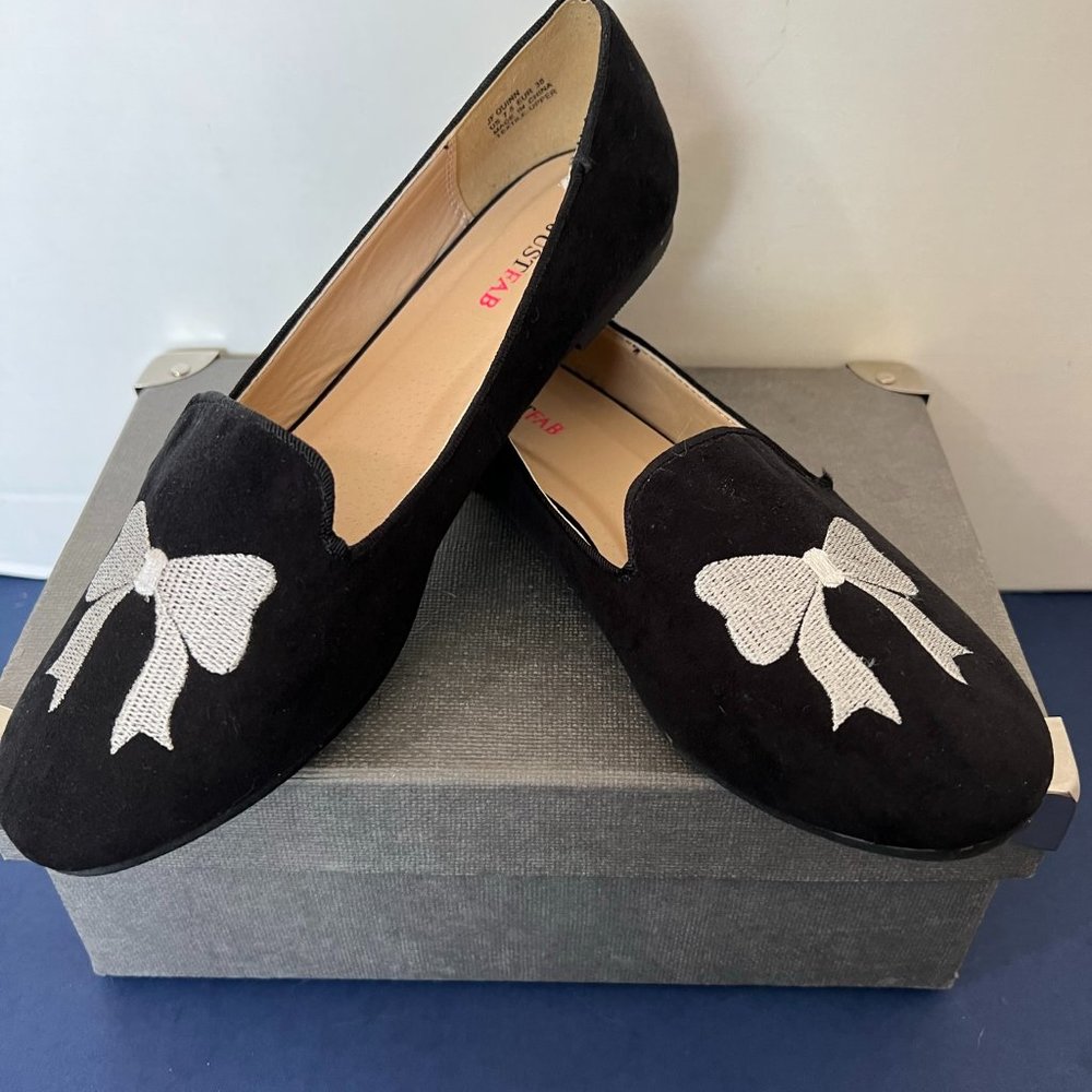 JustFab Black Suede Flat With White Stitched Bow On Toe